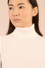Short sleeve turtleneck off white by Molly Bracken