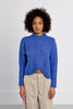 Blue cable knit sweater by Molly Bracken￼