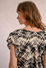 Beige Doli Printed Woven Top by Molly Bracken