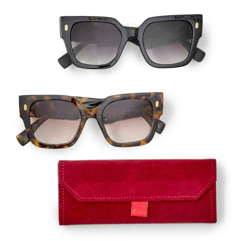 Sunglasses with burgundy case by Two's Company