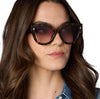 Sunglasses with burgundy case by Two's Company