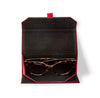 Sunglasses with burgundy case by Two's Company