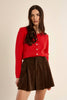 Red cardigan by Molly Bracken