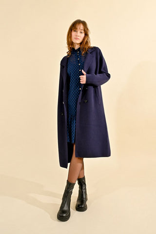 Navy knit coat by Molly Bracken