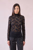 Black lace mock neck top by Molly Bracken