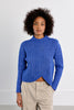 Blue cable knit sweater by Molly Bracken￼