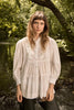 Tiered white blouse by Molly Bracken