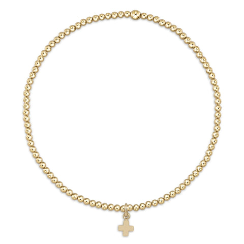 Classic gold 2mm bead bracelet signature cross small gold charm by Enewton