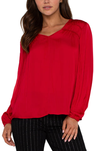 Long sleeve v neck blouse with shirring in tango red by Liverpool