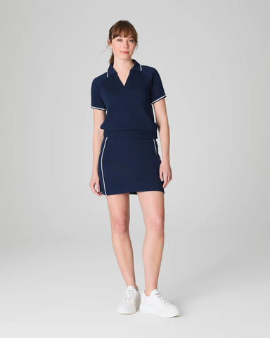 Air pique skort in navy by Spanx