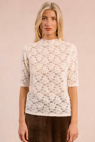 Short sleeve off white lace knit top by Molly Bracken