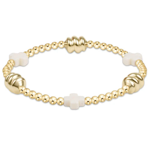 signature cross admire gold pattern 3mm bead bracelet off white by Enewton
