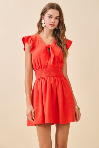 Orange flutter sleeve mini with bow by TCEC
