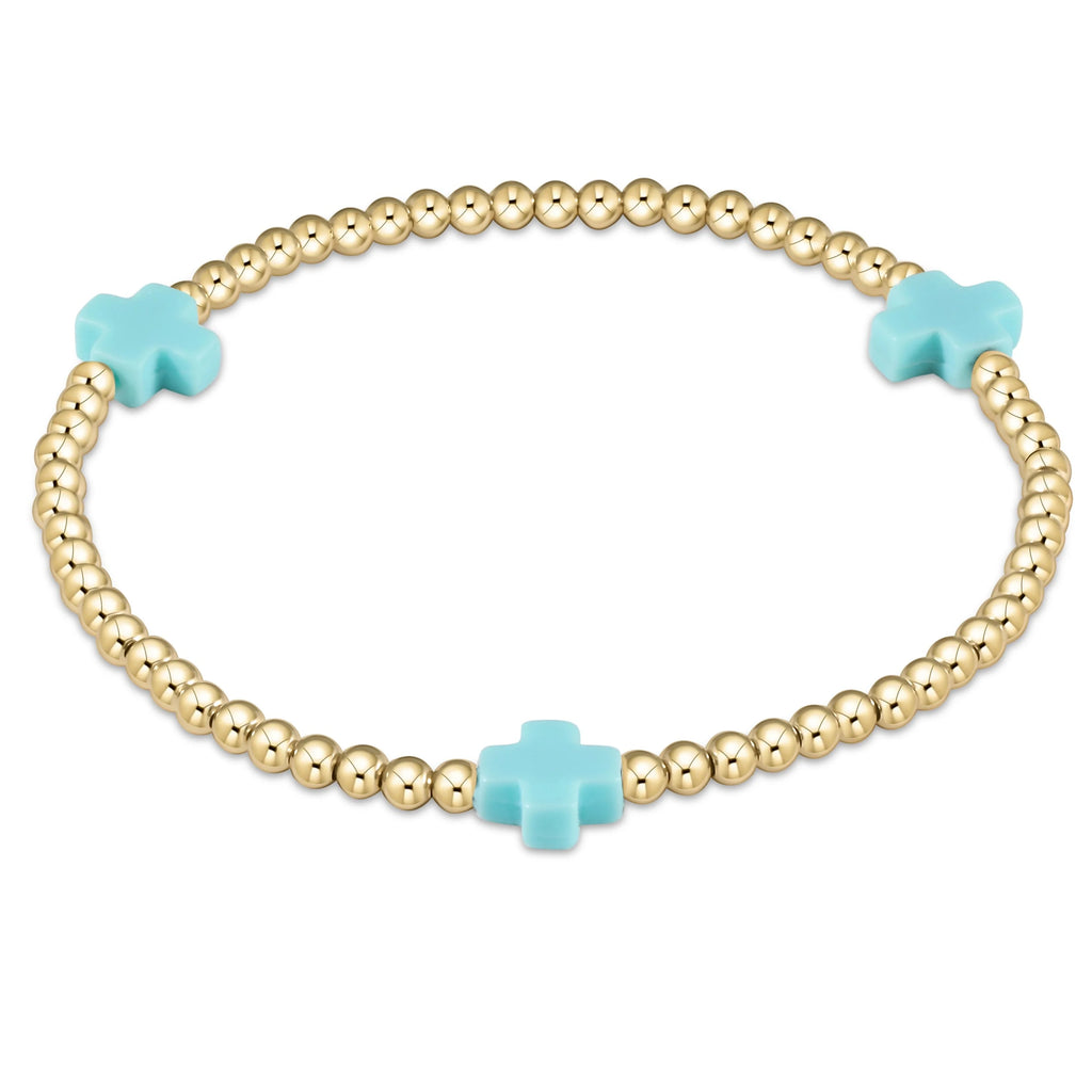 Signature cross 3mm bead bracelet in turquoise by Enewton